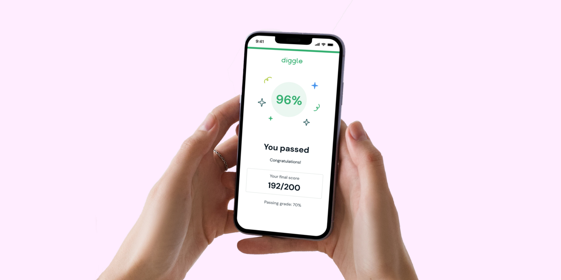 Picture of hands holding iphone with Diggle test results- the user passed the exam.